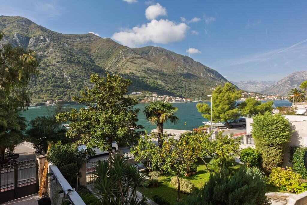 View over the Bay of Kotor and mountains from the garden of VerDi in Dobrota